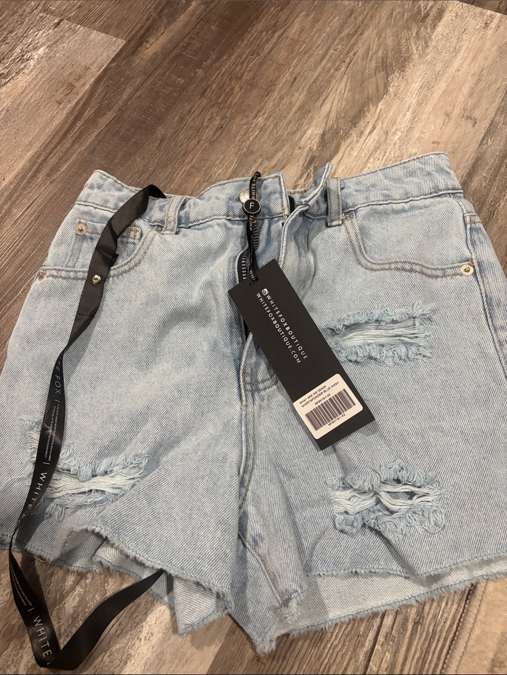 White Fox Boutique Light Blue Distressed Denim Shorts